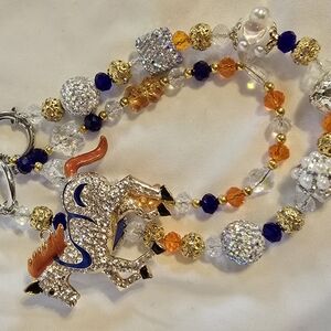 Vibrant Beaded Accessory Chain with Gold Silver and Deep Blue Accents
